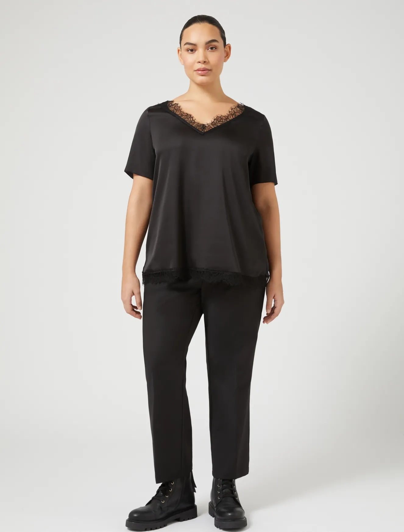 Blusa con dettagli in pizzo