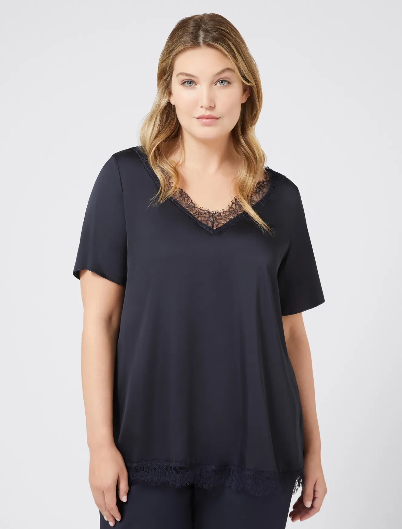 Blusa con dettagli in pizzo