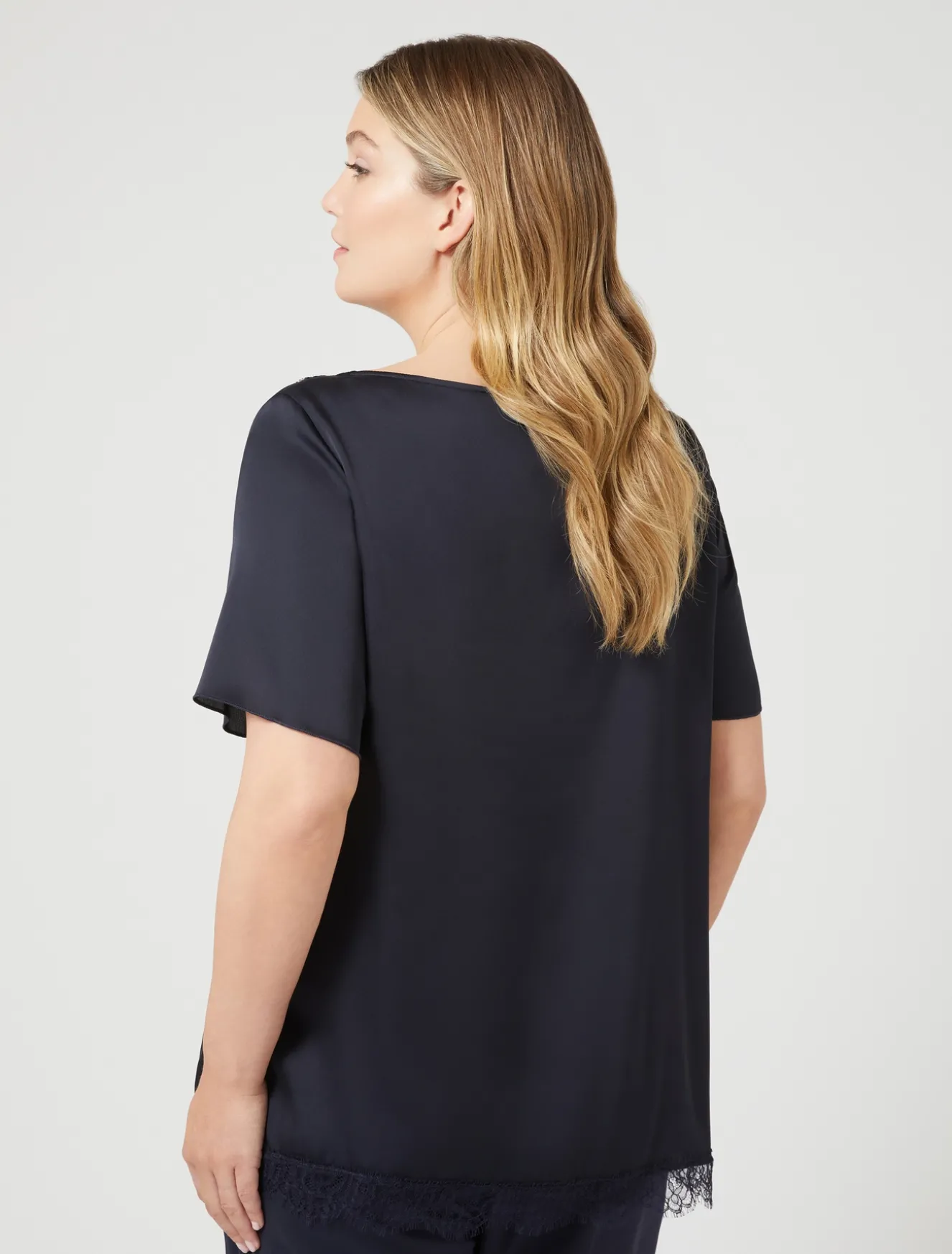 Blusa con dettagli in pizzo