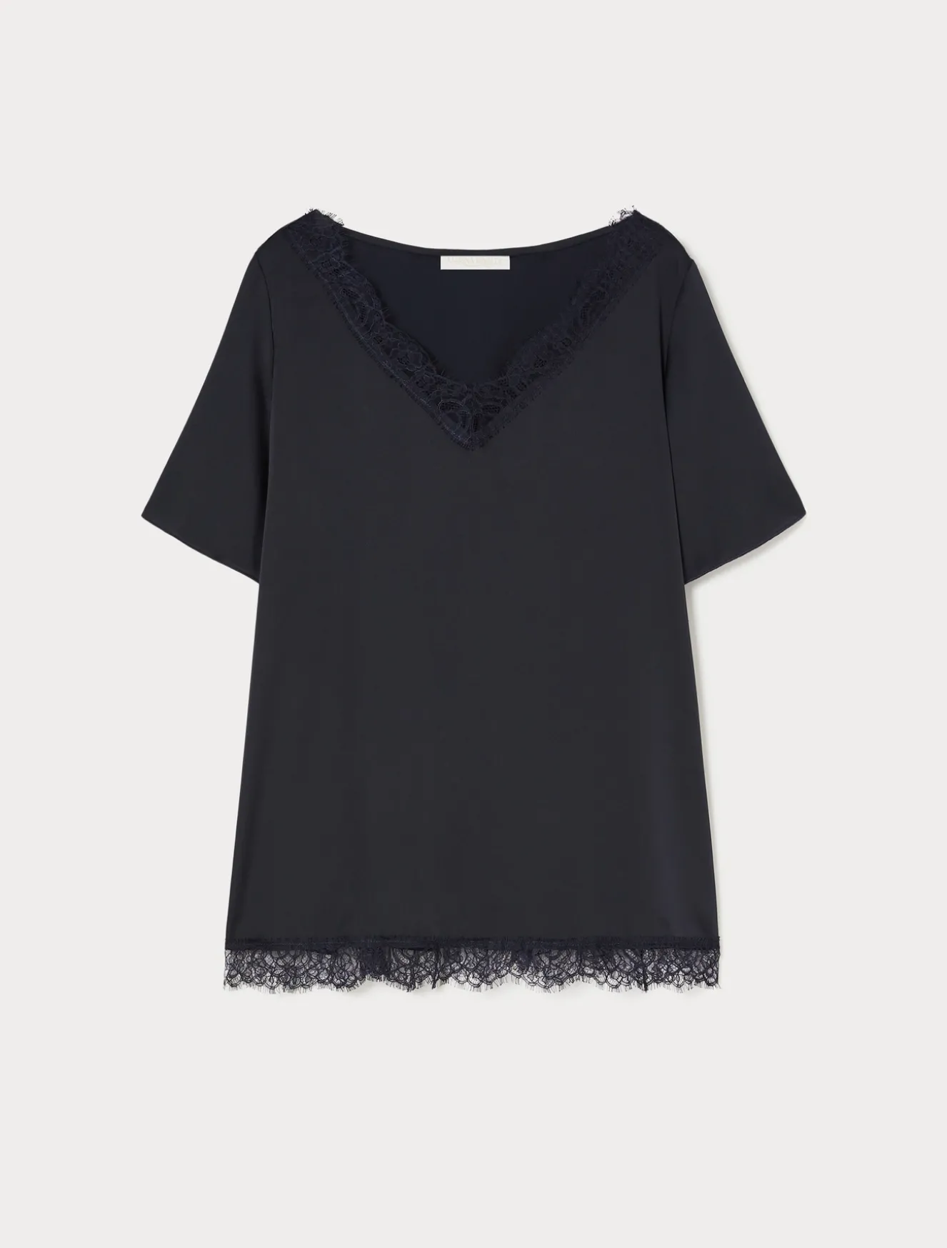 Blusa con dettagli in pizzo