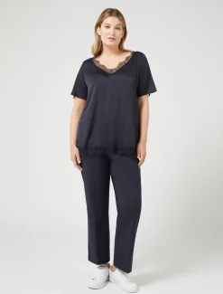 Blusa con dettagli in pizzo