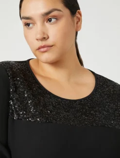 Blusa in crêpe envers satin