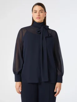 Blusa in crêpe georgette