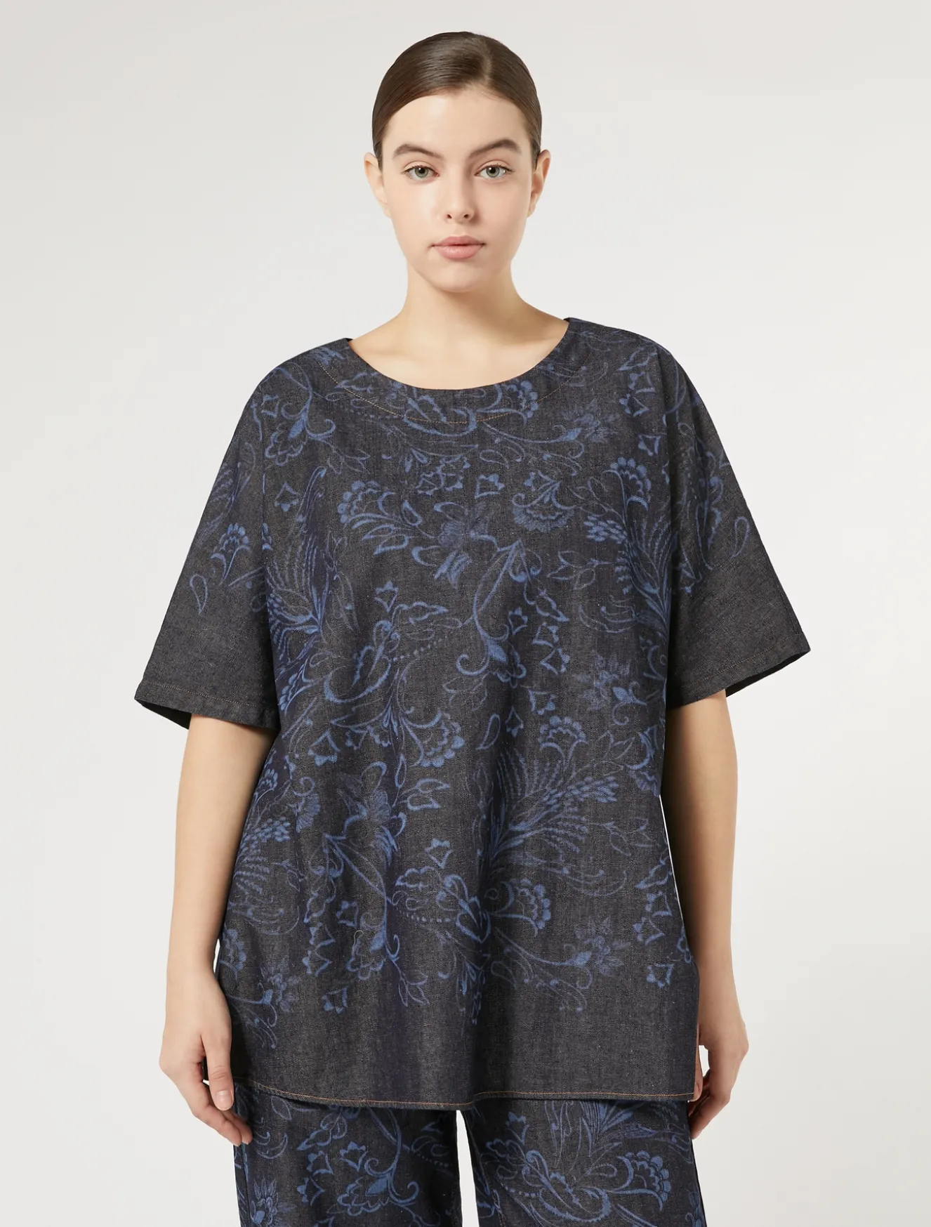Blusa in denim laserato