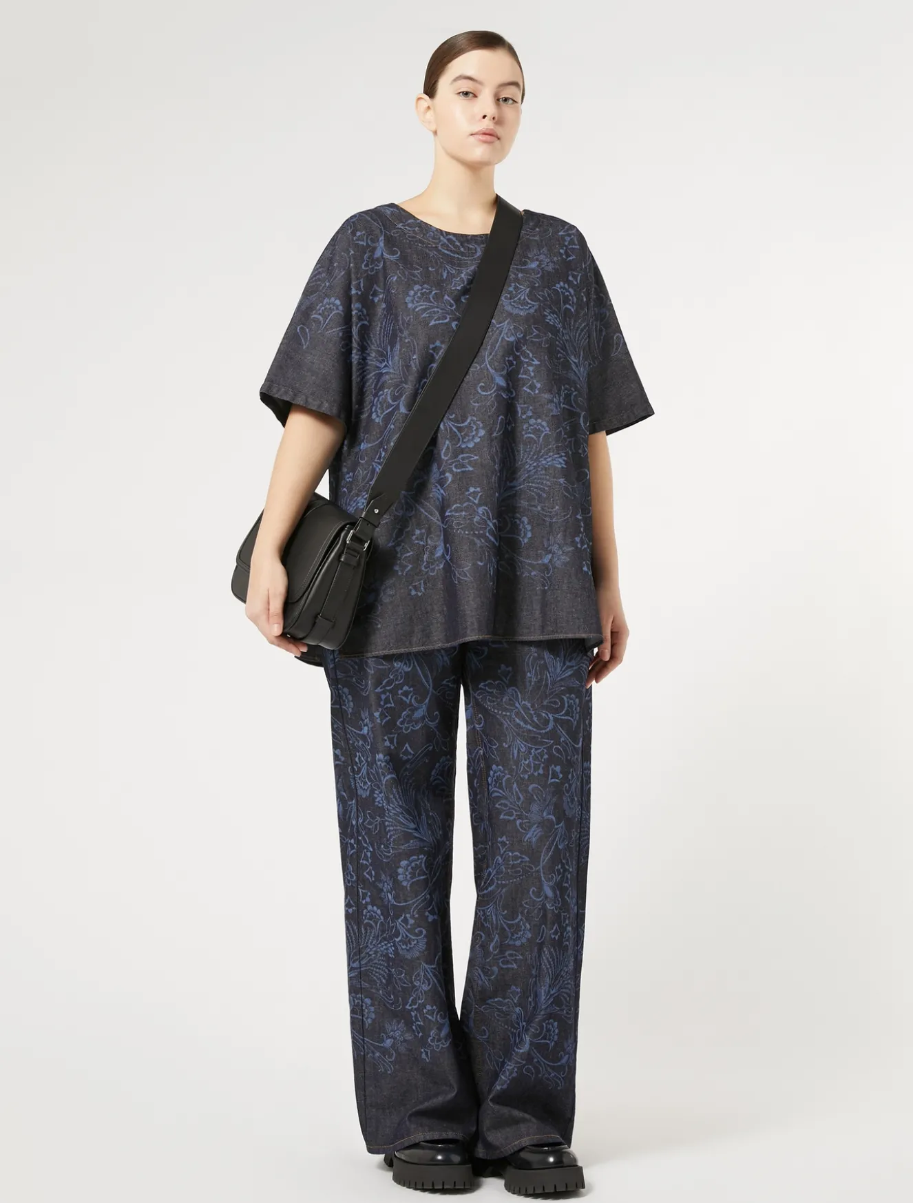 Blusa in denim laserato