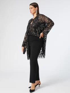 Casacca aperta in tulle plumetis