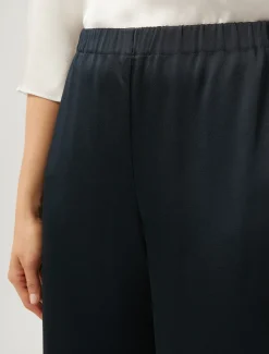 Pantaloni in frisottino lucido