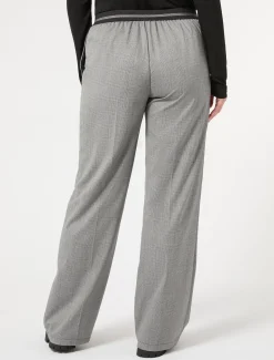 Pantaloni in tessuto tinto filo e lurex