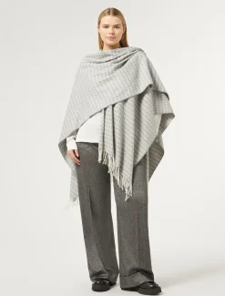 Poncho in tessuto tinto filo