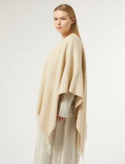 Poncho in tessuto tinto filo