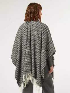 Poncho in tessuto tinto filo