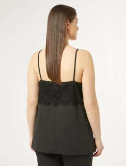 Top in jersey con pizzo