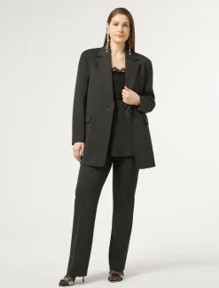 Top in jersey con pizzo